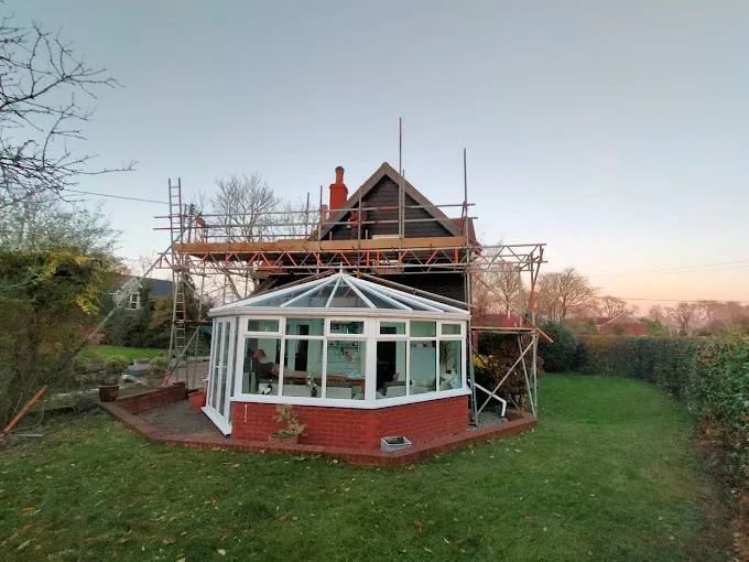Scaffold over a conservatory